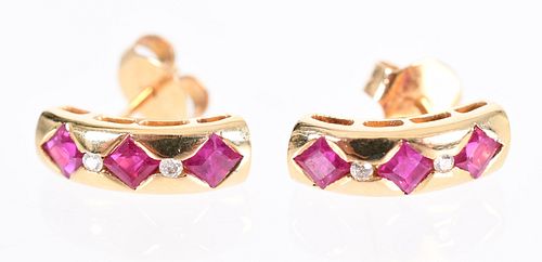 A Pair of 14k Gold and Ruby Earrings
