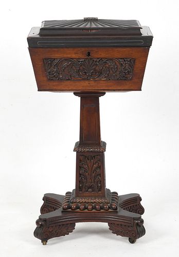 An Anglo-Indian carved rosewood teapoy