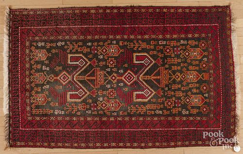 Two semi antique Turkoman carpets, 4'5'' x 2'10'' and 5'4'' x 3'4''.