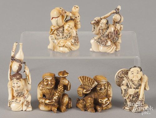 Six Japanese carved ivory netsukes.