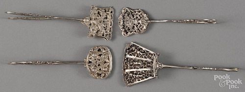 Four Continental 800 silver tongs, late 19th c., probably German, 7.5 ozt.