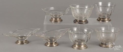 Seven sterling silver mounted glass bowls.