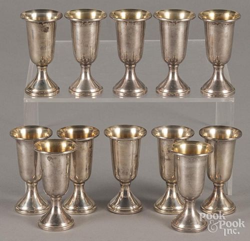 Set of twelve weighted sterling silver cordials, 3 1/8'' h.