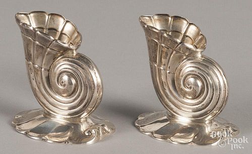 Pair of sterling silver shell-form candlesticks, 3 1/2'' h., 7 ozt.