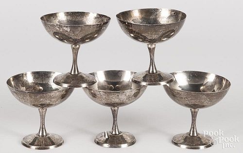 Five sterling silver footed bowls, 4 1/8'' h., 4 1/2'' w., 27.5 ozt.
