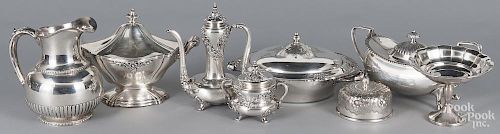 Group of silver plated serving pieces.