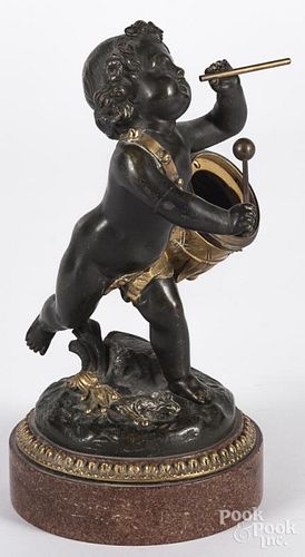 Figural bronze clock holder of a young boy with a drum, 9 1/2'' h.