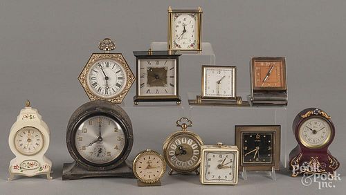 Twelve novelty clocks.