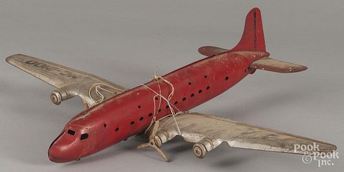 Pressed steel American Airlines airplane with four engines and wood wheels, 27 1/2'' wingspan