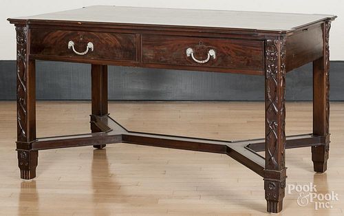 Mahogany partner's desk, late 19th c., with applied carving on legs, 31'' h., 54 1/2'' w., 32'' d.