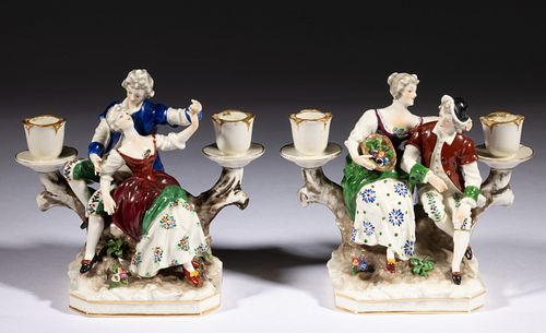 CONTINENTAL PORCELAIN FIGURAL GROUP PAIR OF CANDLE HOLDERS, 