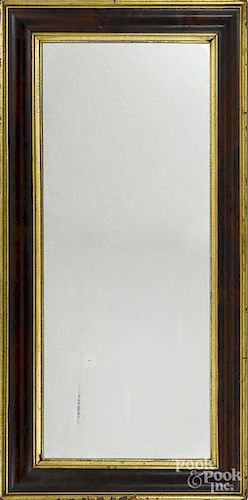 Empire mahogany and giltwood mirror, mid 19th c., 57'' x 28 1/2''.