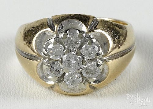 Diamond and 14K yellow gold ring with a cluster of seven round, brilliant cut diamonds