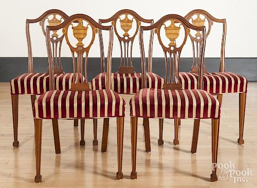 Seven Federal style inlaid mahogany dining chairs, one ca. 1900 and the remainder made later