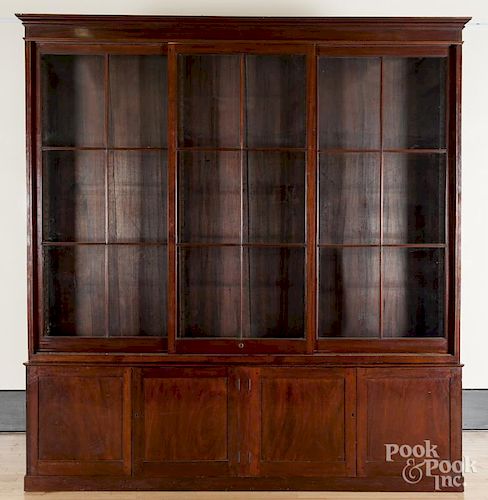 George III mahogany breakfront bookcase, late 18th c., 99 1/2" h., 92" w.