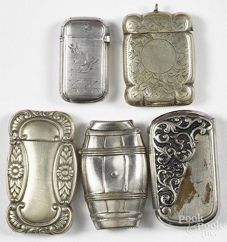 Five nickel silver match vesta safes, one of barrel form, one with engraved bird decoration, etc.