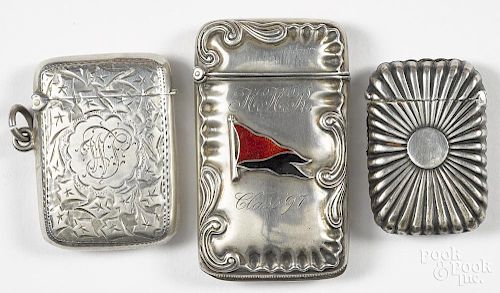 Three sterling silver match vesta safes, to include one inscribed Class of '97