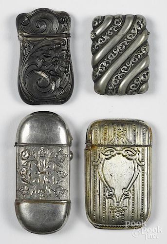 Four embossed silver plated match vesta safes, one with heavy art nouveau floral decoration