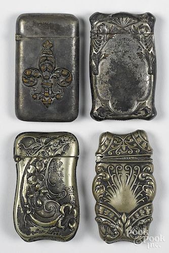 Four German silver embossed match vesta safes, one with fleur de lis