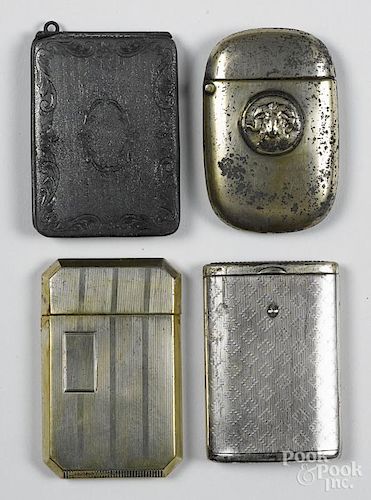 Four sterling silver match vesta safes, one with an embossed ram, tallest - 2 5/8''.