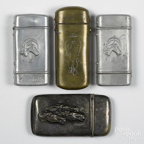 Four horse match vesta safes, to include two aluminum, one engraved brass, and one nickel silver