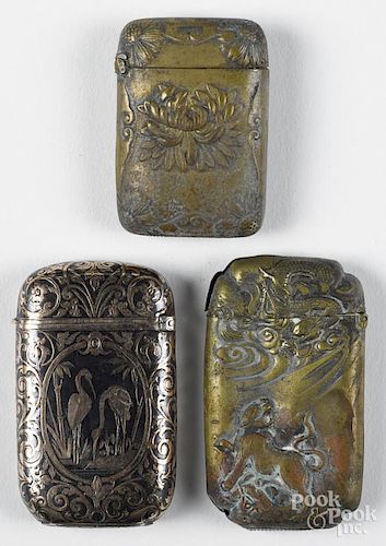 Three Japanese mixed metal match vesta safes, to include one with embossed dragon decoration, 2 1/8''