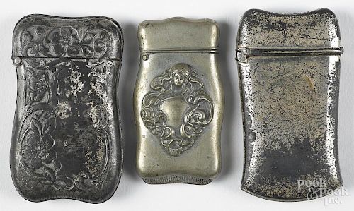 Three German silver match vesta safes, one with a heavily embossed art nouveau woman