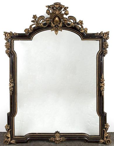 Large walnut and gilt mirror, mid 19th c., 72 1/2'' h., 52'' w.