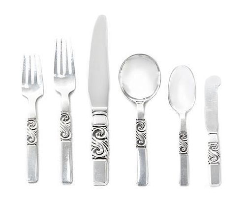 A Danish Silver Flatware Service, Georg Jensen Silversmithy, Copenhagen, 1945-77, Scroll pattern, comprising 12 dinner knives 12