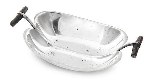 A Finnish Silver Two-Handled Bowl, Tapio Wirkkala, 1958, formed on double lobes, the ends with upswung handles centered by eboni