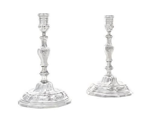 A Pair of Danish Silver Candlesticks, Anton Michelsen, Copenhagen, 1929, on domed shaped circular bases chased with shellwork fl