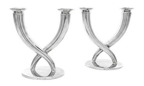 A Pair of French Silver-Plate Two-Light Candelabra, Gio Ponti for Christofle, Paris, Circa 1960, the circular bases supporting t
