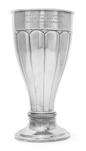* An Austrian Silver Presentation Cup, Maker's Mark MG in an octagon, Circa 1870, on a stepped circular base, the elongated bowl