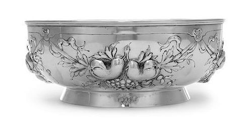 A German Silver Bowl, Early 20th Century, circular, the sides embossed and chased in high relief with ribbon-tied swags of fruit