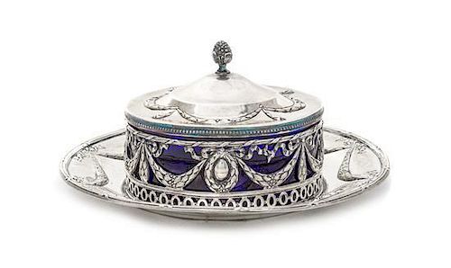 * A German Silver and Cobalt Glass Covered Caviar Dish, , circular with bound reeded rim, the border and cover chased with ribbo