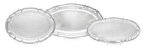 Three Similar Continental Silver Meat Platters, Austrian (1) and Romanian (2), Early 20th Century, all shaped oval with applied