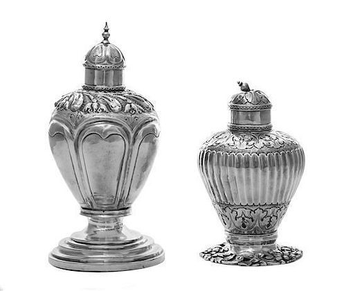 A Pair of Dutch Silver Casters, Haarlem, 1819 and 1852, both of inverted pear form with lift-off tops, the smaller with fluted s