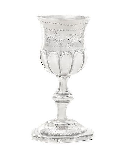 A Polish Silver Kiddush Cup, Krakow, 1847, on an octagonal plinth engraved with wrigglework topped by a domed base engraved with