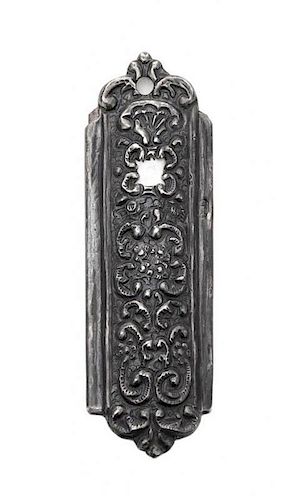 A Silver Mezuzah, 20th Century, chased with dense flowers, foliage and shellwork, slide-off copper backplate
