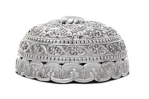A Turkish Silver Wedding Cap, 20th Century, with scalloped rim, embossed and chased overall with flowers, foliage and arabesques