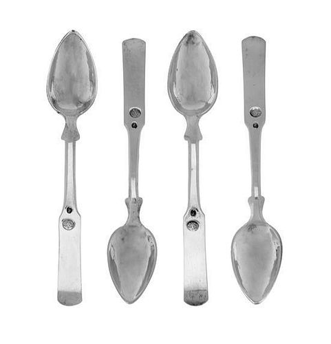 A Set of Four Turkish Silver Teaspoons, Circa 1900, the fiddle handles with rounded down-turned terminals, slightly pointed bowl