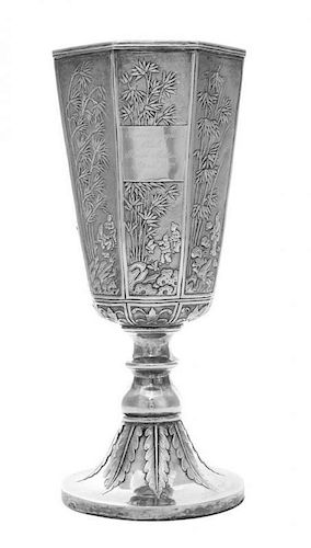 Canton Regatta Cup: A Chinese Export Silver Presentation Cup, Khecheong, Canton, Circa 1850, the deep bowl of panelled tapered c