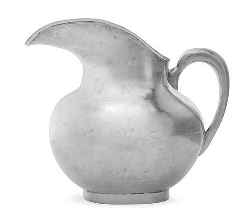 A Peruvian Silver Water Pitcher, Mid 20th Century, of oval baluster form with loop handle and elongated spout, raised on oval ba