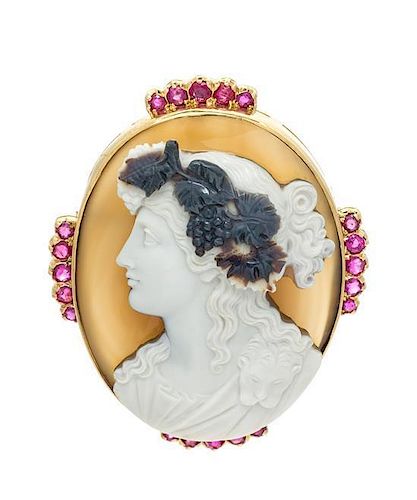 An 18 Karat Yellow Gold, Carved Agate Cameo and Ruby Pendant/Brooch, 35.90 dwts.