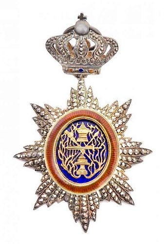 * A French Silver and Enamel Royal Order of Cambodia, 1st Half 20th Century, formed as a faceted star centered by a translucent