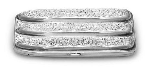 A Silver Cigar Case, Possibly American, Late 19th Century, shaped rectangular and fitted for three cigars, the hinged covers bri