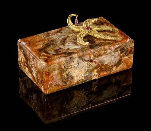 * An Italian Silver-Gilt and Pink Sapphire-Mounted Petrified Wood Box, Nardi, Venice, 20th Century, the rectangular body and hin