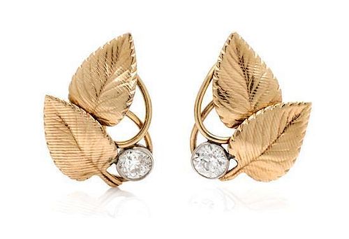 * A Pair of Yellow Gold, Platinum and Diamond Leaf Motif Earclips, Harry S. Bick & Sons, 3.80 dwts.