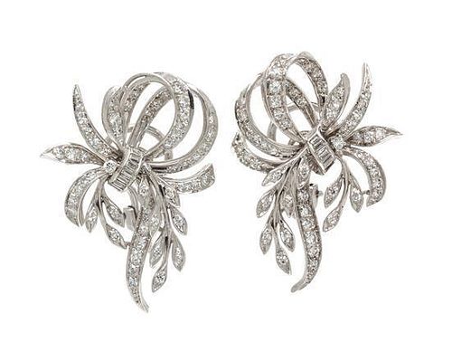 * A Pair of Platinum and Diamond Earclips, 13.60 dwts.