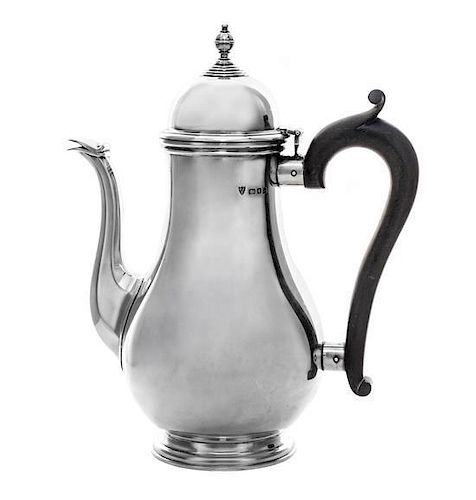 An English Silver Coffee Pot, Ellis Jacob Greenberg, London, 1925, Retailed by Tiffany & Co., of baluster form with faceted spou